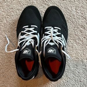 New Balance molded baseball cleats never worn size 11 with box.